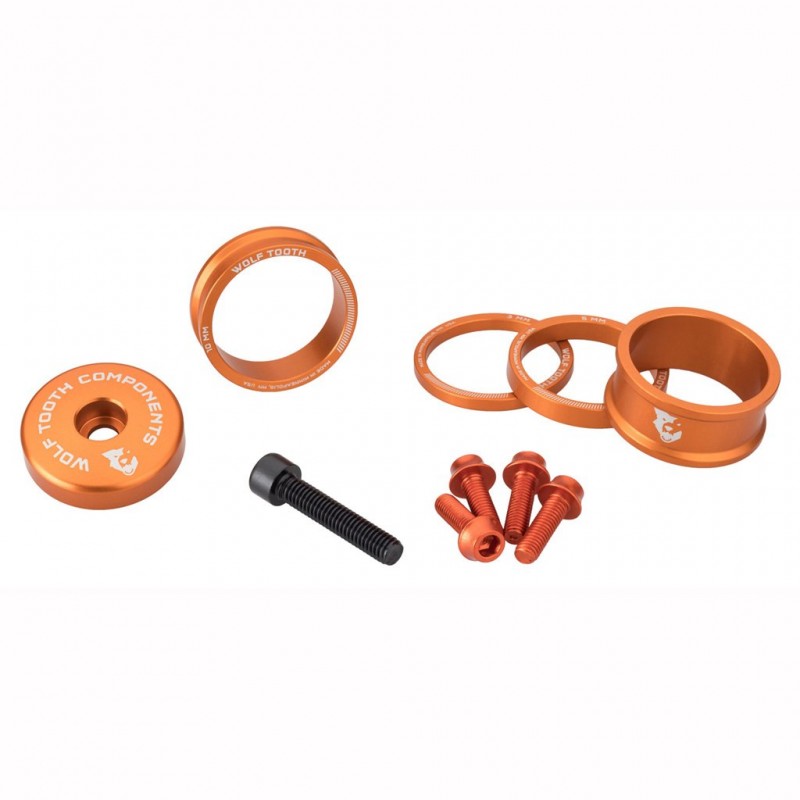 Afstandsbussen, stuurpenafdekking en schroeven Kit WOLFTOOTH BLING KIT Oranje