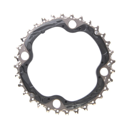 Middenblad SHIMANO SLX M660/670/XT M780 10-speed, 4-gaats, 104 mm — kettingblad tegen witte achtergrond