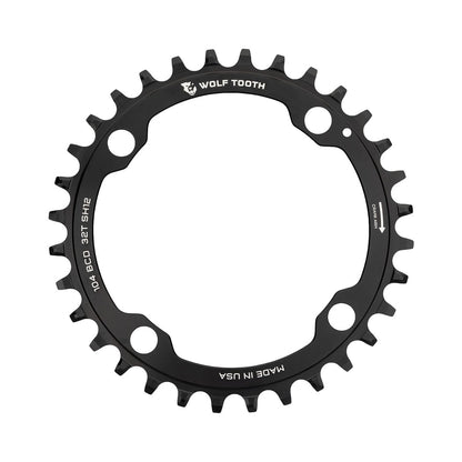 Enkel kettingblad WOLF TOOTH 104 BCD 12 versnellingen Shimano 4 boutgaten 104 mm zwart — kettingblad op witte achtergrond