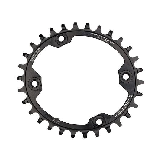 Ovaal enkel kettingblad WOLF TOOTH ELLIPTICAL 96 BCD 11 versnellingen Shimano XTR M9000/9020 4 boutgaten 96 mm zwart — kettingblad op witte achtergrond