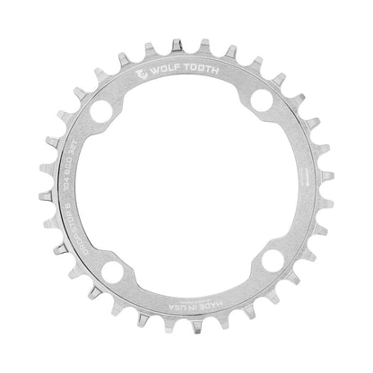 Enkel kettingblad WOLF TOOTH DROP-STOP B 104 mm, ongepolijst zilver — kettingblad op witte achtergrond