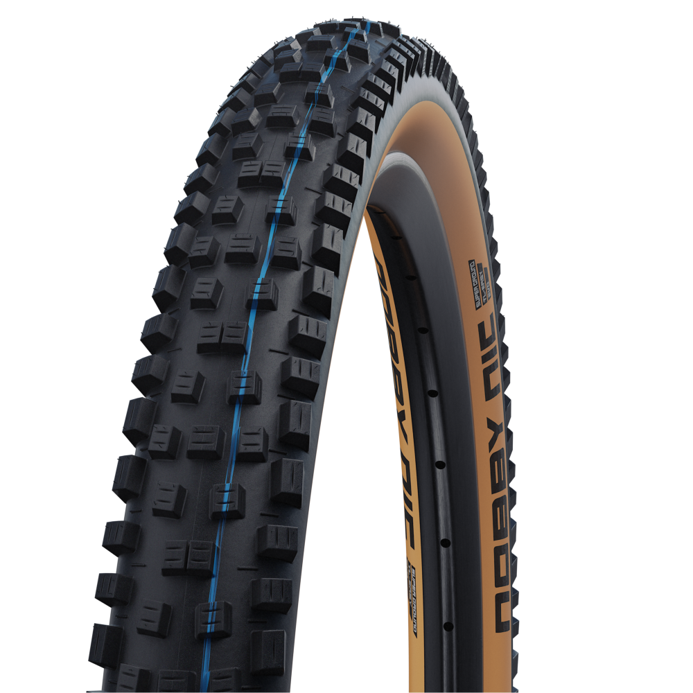 Pneu SCHWALBE NOBBY NIC 27.5x2.40 ADDIX SPEEDGRIP SUPERGROUND Snakeskin Tubeless Ready Souple Noir/Marron