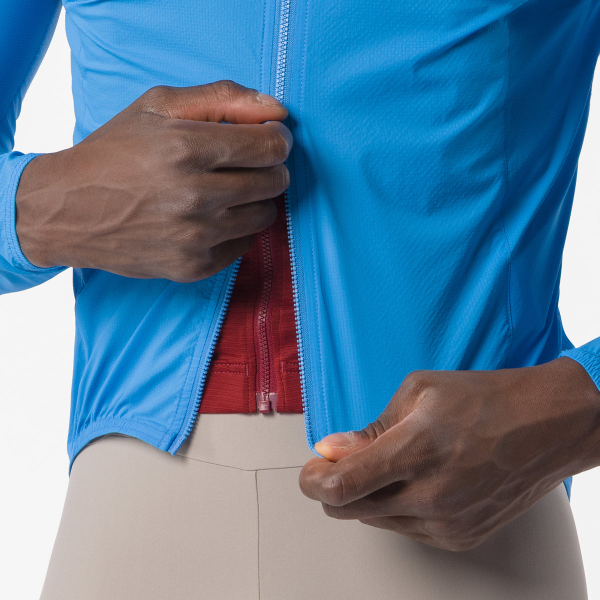 Blauwe CASTELLI Transition Air-jas – detail van de tweewegrits