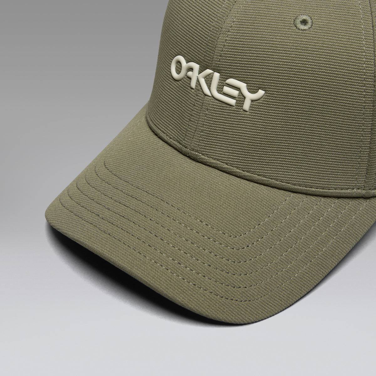Pet OAKLEY 6 PANEL STRETCH METALLIC Kaki
