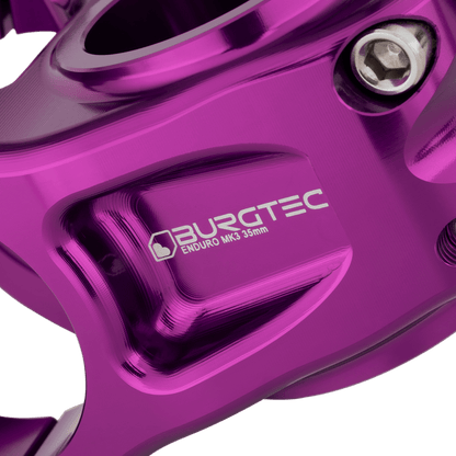 BURGTEC ENDURO MK3 stuurpen paars — detail van de gefreesde behuizing