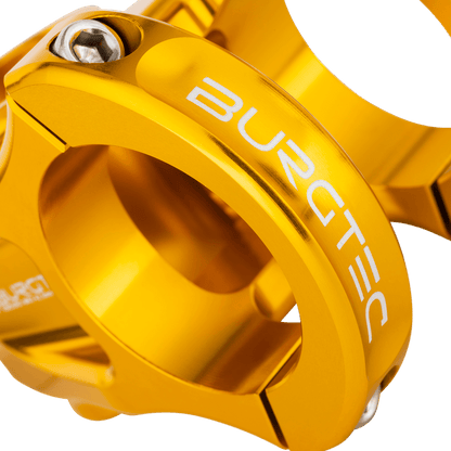 Potence BURGTEC ENDURO MK3 Or — détail du serrage du cintre