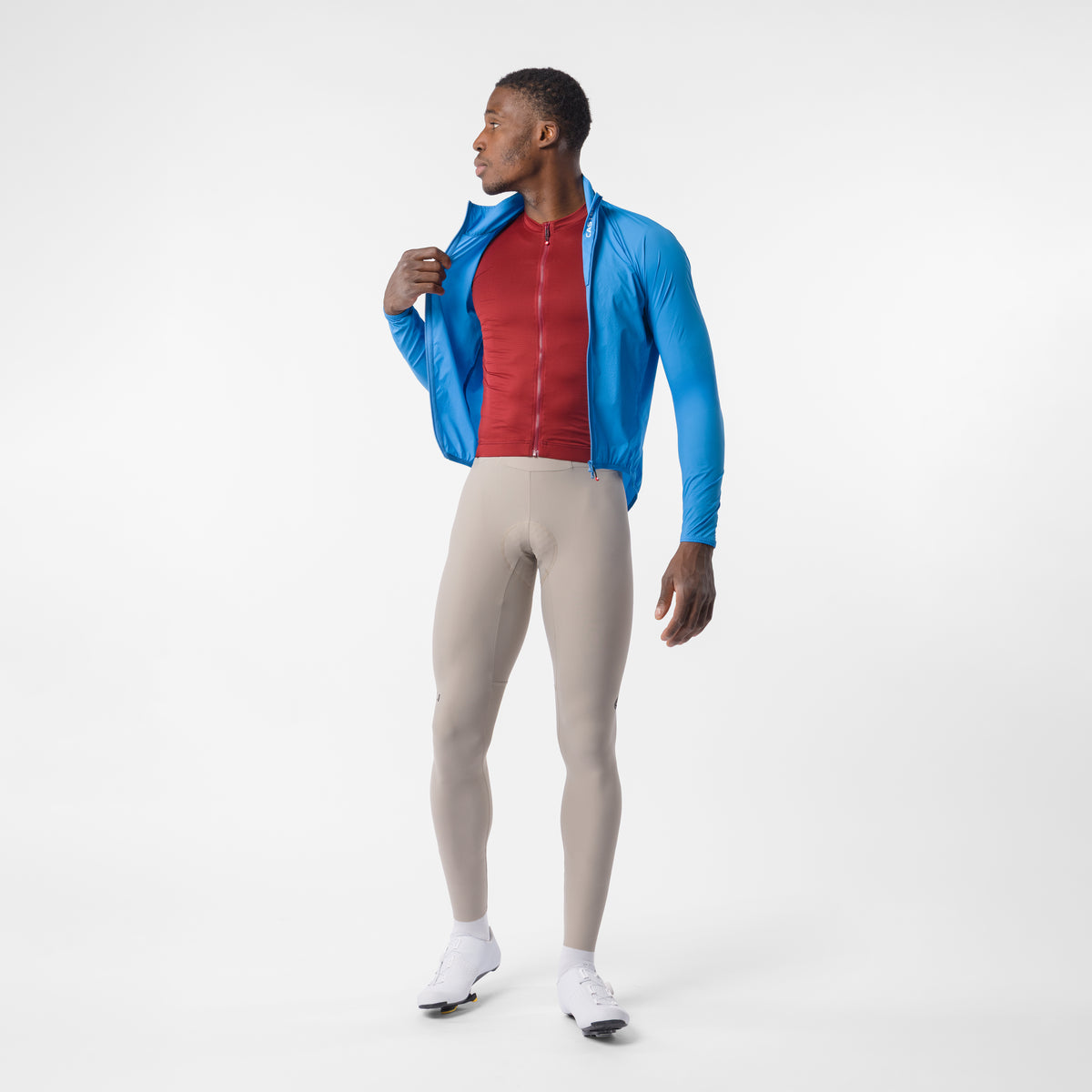 Blauwe CASTELLI Transition Air-jas – open gedragen