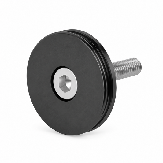 Zwarte FIDLOCK VACUUM-stuurpenkap — product op witte achtergrond
