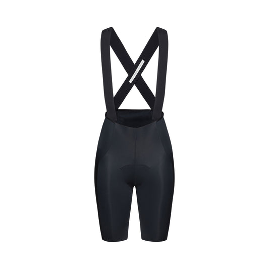 Korte POC RACEDAY-fietsbroek met bretels voor dames, zwart — witte achtergrond, 2000 x 2000