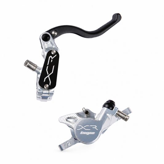 HOPE XCR PRO X2 PM-rem zilver — remhendel en remklauw op een witte achtergrond